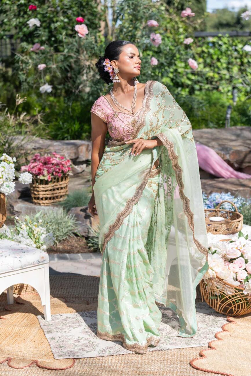 Sage green designer saree by Rashi Sharma: SARA By Rashi