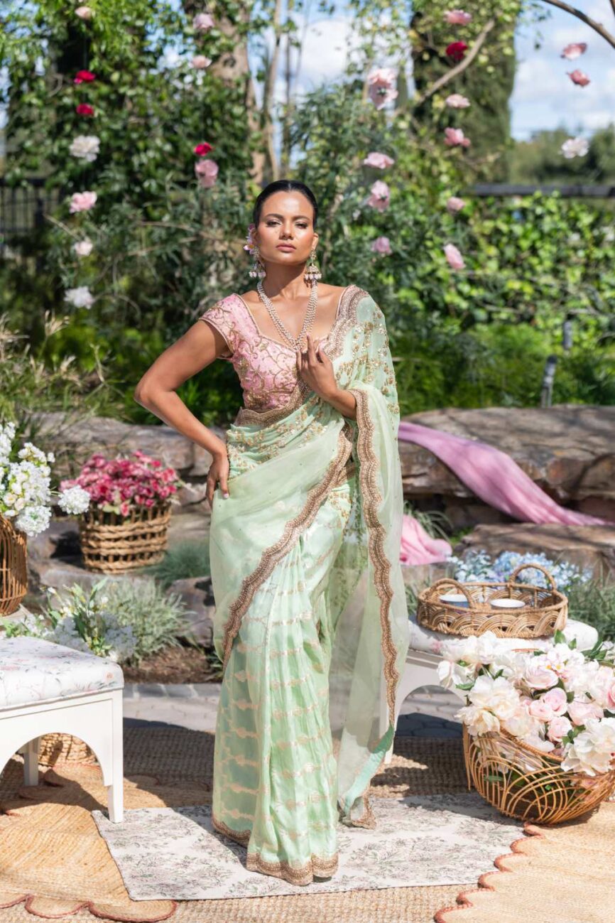 Sage green designer saree by Rashi Sharma
