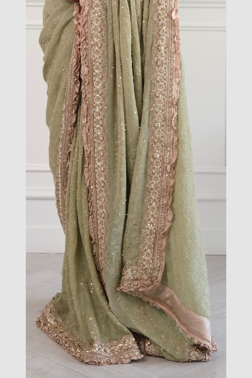 Model wearing green and taupe chikankari saree – designer ethnic wear by SARA by Rashi.