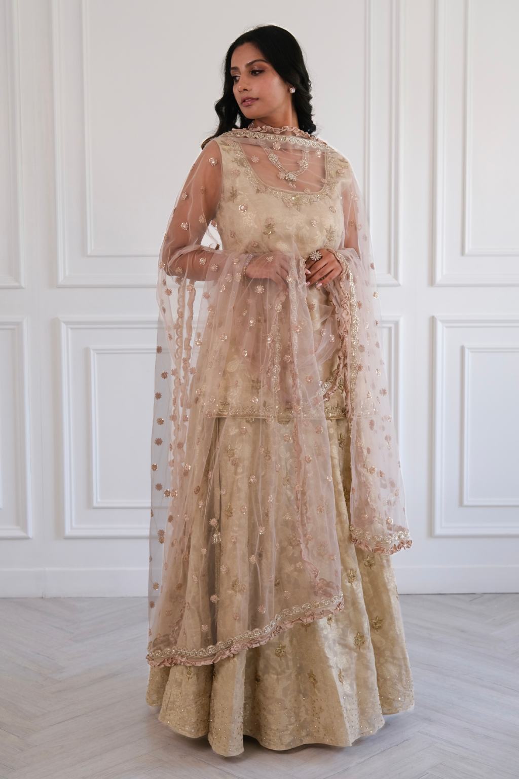 Ivory Banarasi hand-embroidered lehenga kurta set – bridal and festive wear by SARA by Rashi.