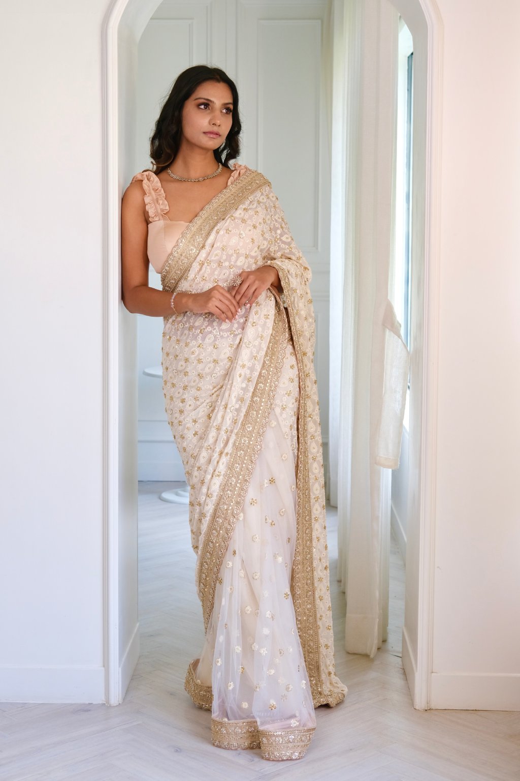 Ivory hand-embroidered chikankari saree – full draped look by SARA by Rashi.