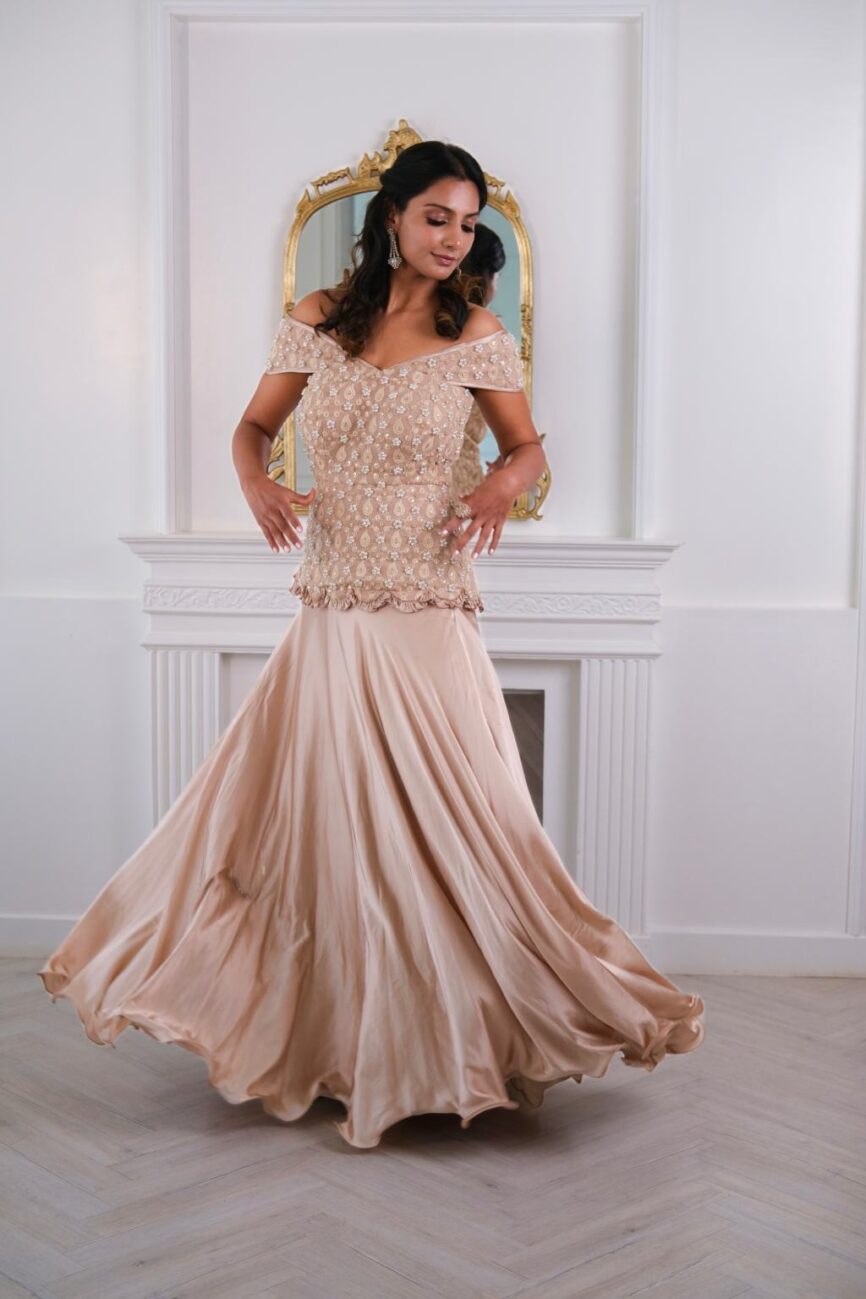 Close-up of hand embroidery detailing on the designer top from the Taupe Satin Skirt set.