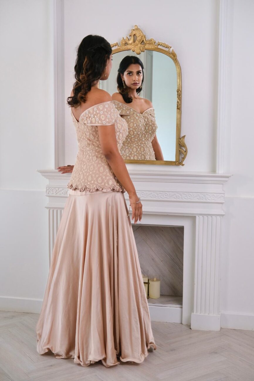 Model wearing Taupe Satin Skirt with Hand-Embroidered Top from the Luxe Collection by SARA by Rashi.