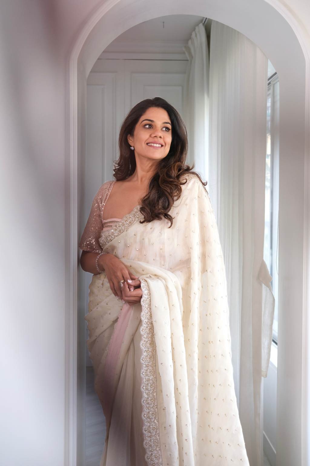 White tissue saree with delicate chikankari embroidery – full draped look by SARA by Rashi.