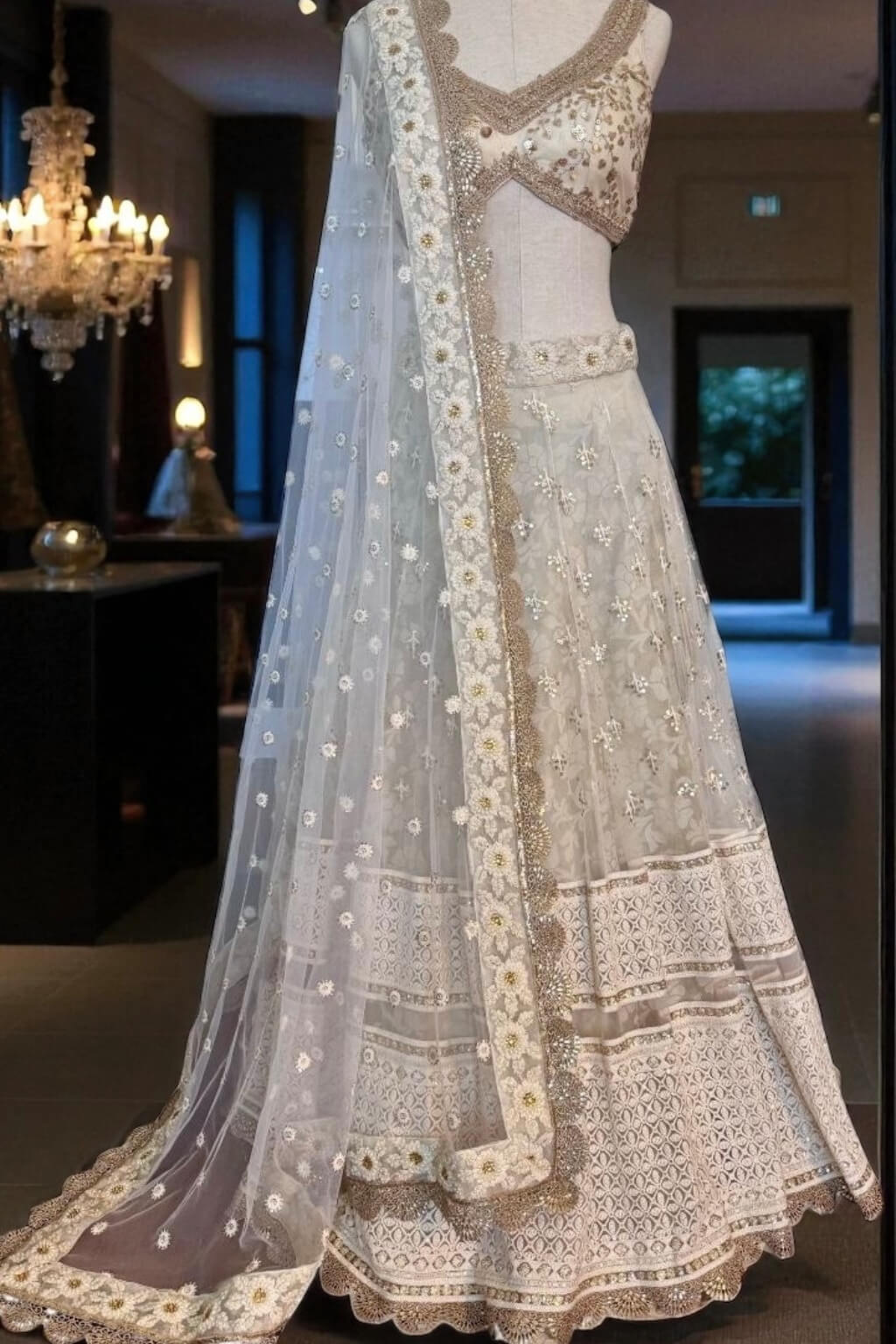 White and gold chikankari net lehenga set